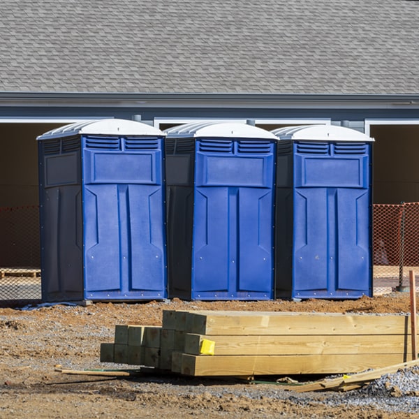 what is the cost difference between standard and deluxe porta potty rentals in Dayton